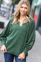 The Slouchy Olive Two Tone Knit Notched Raglan Top