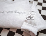 One More Chapter Embroidered Crewneck | Sweatshirt